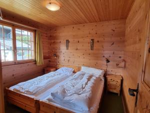 A bed or beds in a room at Zer Tanna
