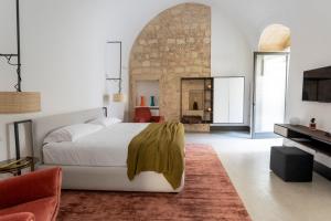 TV o dispositivi per l'intrattenimento presso Palazzo De Noha - Boutique Hotel