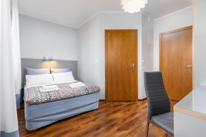 Posteľ alebo postele v izbe v ubytovaní Villa Bianca