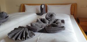 מיטה או מיטות בחדר ב-Haus Blindauer Eck