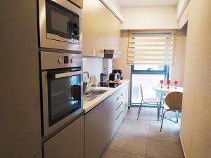 A kitchen or kitchenette at Somerset Maslak Istanbul
