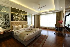 Postel nebo postele na pokoji v ubytování Stardom Resort Jaipur