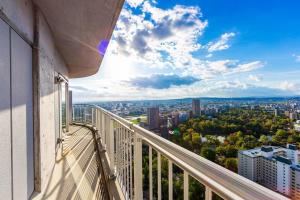 a balcony with a view of a city at Meteor Shower in Sapporo
