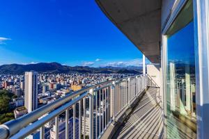 a view of a city from the balcony of a building at Meteor Shower in Sapporo