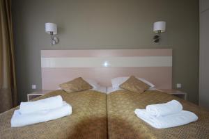Postel nebo postele na pokoji v ubytování Apartament Czarna Gora Is6