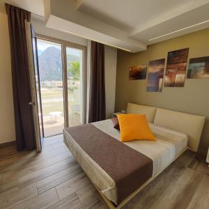 Postel nebo postele na pokoji v ubytování Sundeck Hotel + 37 fotografií