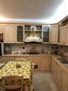 Kuchyňa alebo kuchynka v ubytovaní Casa dolce casa + 8 fotografií