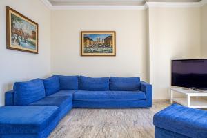 En sittgrupp på Ortigia Seafront Apartment by Wonderful Italy