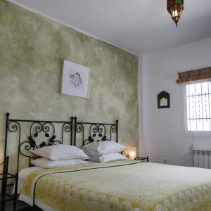 Cama o camas de una habitación en New Leaf Cortijo Apartment ,Moclin