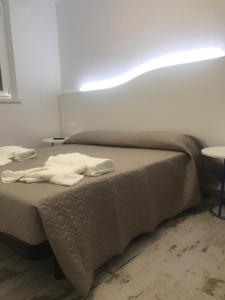 Krevet ili kreveti u jedinici u okviru objekta Casabianca Appartamenti