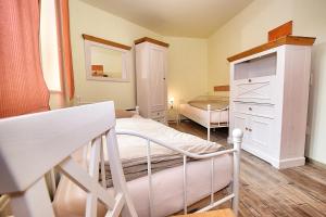 Postel nebo postele na pokoji v ubytování Zum Alten Krug