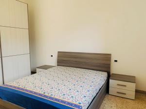 Posteľ alebo postele v izbe v ubytovaní Albero d'Oro