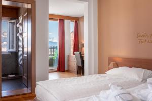 Postel nebo postele na pokoji v ubytování Boutique Hotel Art de Vivre & SPA