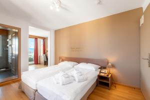Postel nebo postele na pokoji v ubytování Boutique Hotel Art de Vivre & SPA