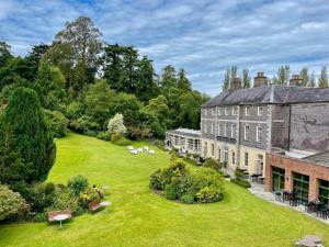 an aerial view of a house with a large yard at Maryborough Hotel & Spa in Cork