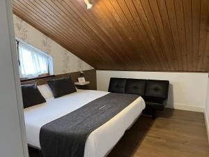 Ліжко або ліжка в номері Hotel Avelina