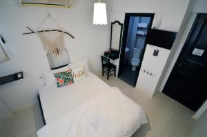 Postel nebo postele na pokoji v ubytování Uyku Butik Otel