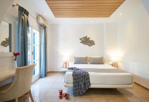 Krevet ili kreveti u jedinici u okviru objekta Hermes Hotel