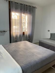 Ein Bett oder Betten in einem Zimmer der Unterkunft POMPEI FELIX