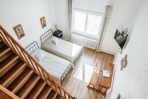 Postel nebo postele na pokoji v ubytování Relais des combrailles
