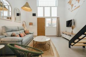 TV a/nebo společenská místnost v ubytování Tu casa duplex en Triana