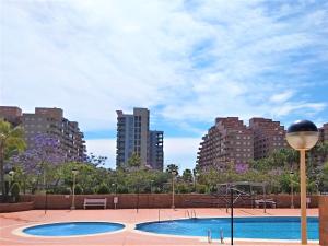 Bazén v ubytování ACV - Torremar-2ª Linea Planta 4 norte nebo v jeho okolí