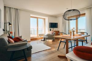 TV a/nebo společenská místnost v ubytování Hotel Haus am Meer