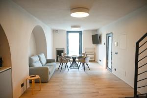 a living room with a couch and a table at La casa di Alice in Monopoli