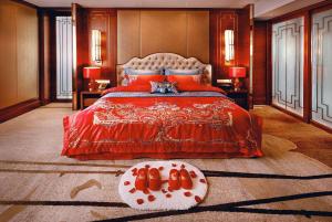 Letto o letti in una camera di Wyndham Jingzhou