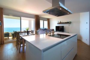 Kuchyň nebo kuchyňský kout v ubytování SUNNY DAY APARTMENT CALACEITE