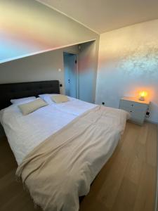 Ένα ή περισσότερα κρεβάτια σε δωμάτιο στο Vanalinna apartment