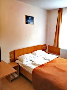 Postel nebo postele na pokoji v ubytování HOSTEL CPPI Nord