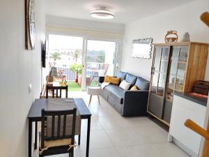 Posezení v ubytování Apartment Aqui Todo Empieza - Pool view - Free WiFi - smart TV-Residence Senator