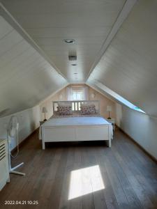 Кровать или кровати в номере De Stille Weier