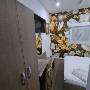 Postel nebo postele na pokoji v ubytování Garni Hotel & Spa Nicolo
