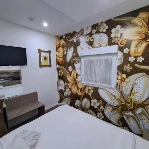 Postel nebo postele na pokoji v ubytování Garni Hotel & Spa Nicolo