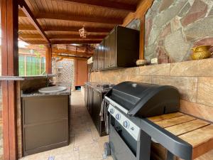 A kitchen or kitchenette at Luxury Villa Los Gigantes