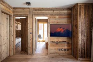 TV a/nebo společenská místnost v ubytování Polaris 1 001 - LUXE & SKI LIFT apartment 6 pers