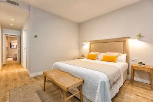 A bed or beds in a room at iloftmalaga SkyGarden