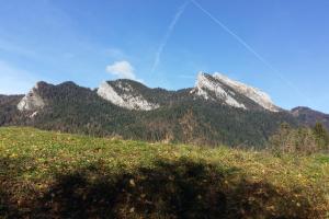 a mountain range with snow capped mountains in the background at Le Chartreux de Saint Pierre de Chartreuse in Saint-Pierre-de-Chartreuse +22 photos