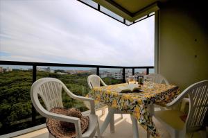 En balkon eller terrasse på Appartamenti Oasi