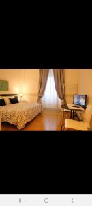 Łóżko lub łóżka w pokoju w obiekcie SHL BARI CITY TERMINAL locazione turistica