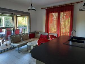 Χώρος καθιστικού στο Cottage les Verveines de Vaison