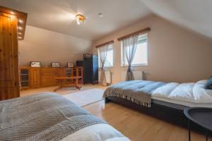 Posteľ alebo postele v izbe v ubytovaní 101 Apartman Agárd,Török Bálint utca 101