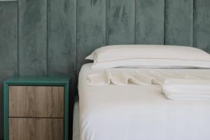 Postel nebo postele na pokoji v ubytování BluMare Resort