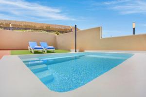Bazén v ubytovaní Villa Rural Los Corcos Private Pool alebo v jeho blízkosti