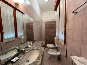 Ένα μπάνιο στο Hotel Adriatico