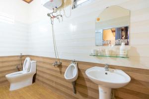 Koupelna v ubytování Homestay Vườn Tùng