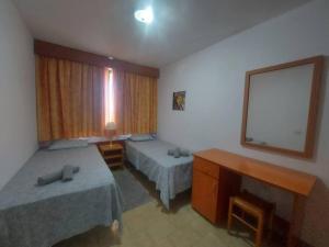 Postel nebo postele na pokoji v ubytování Monteparaiso Seaview 1104