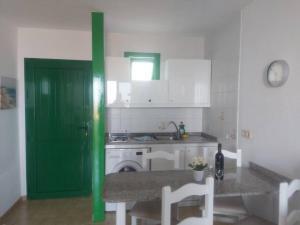 Kuchyň nebo kuchyňský kout v ubytování Monteparaiso Seaview 1104
